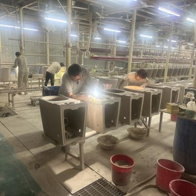 The toilet roughs-in are being prepared for finishing.